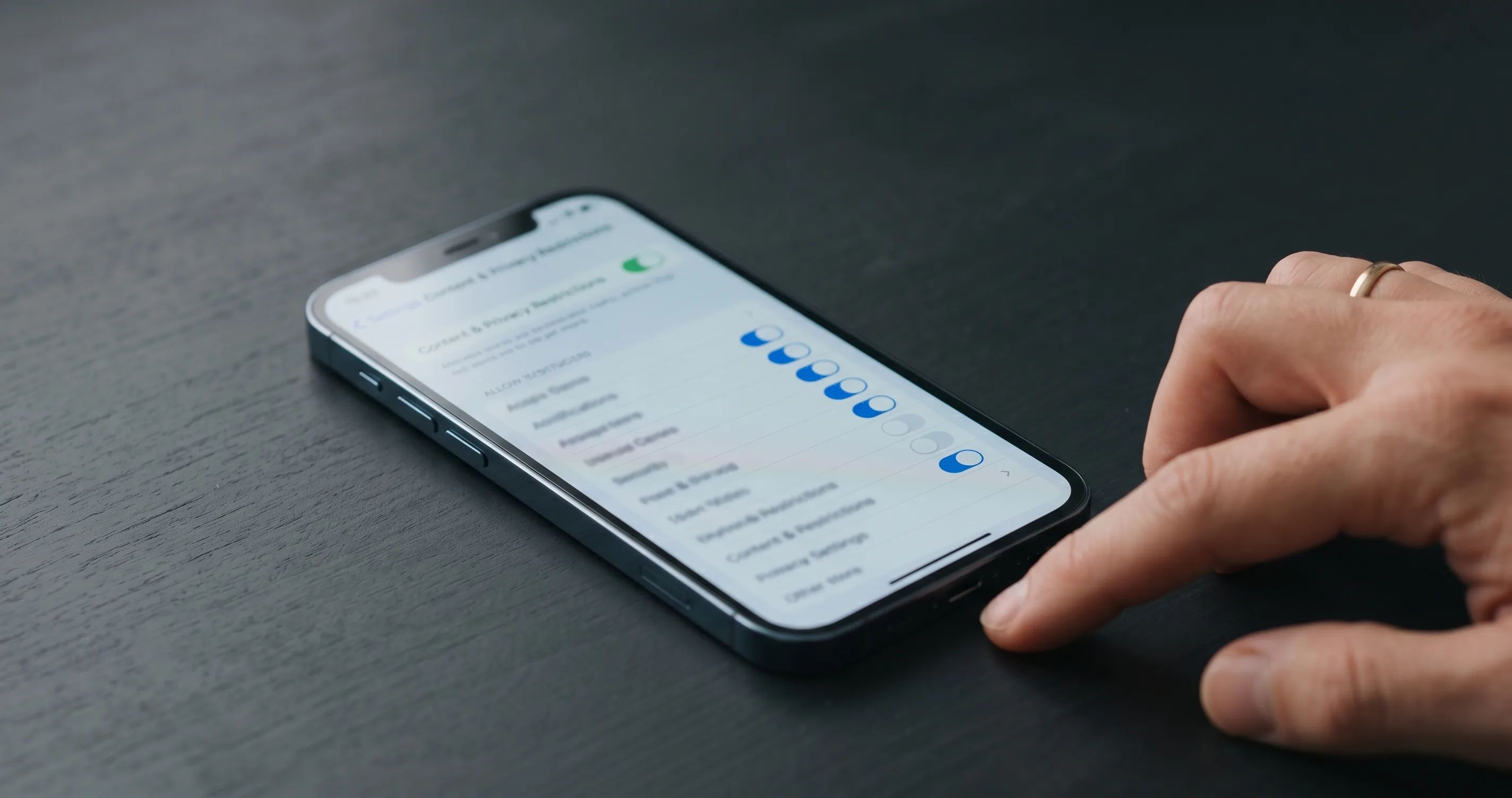 iPhone settings screen showing content restrictions - how to block porn on iphone