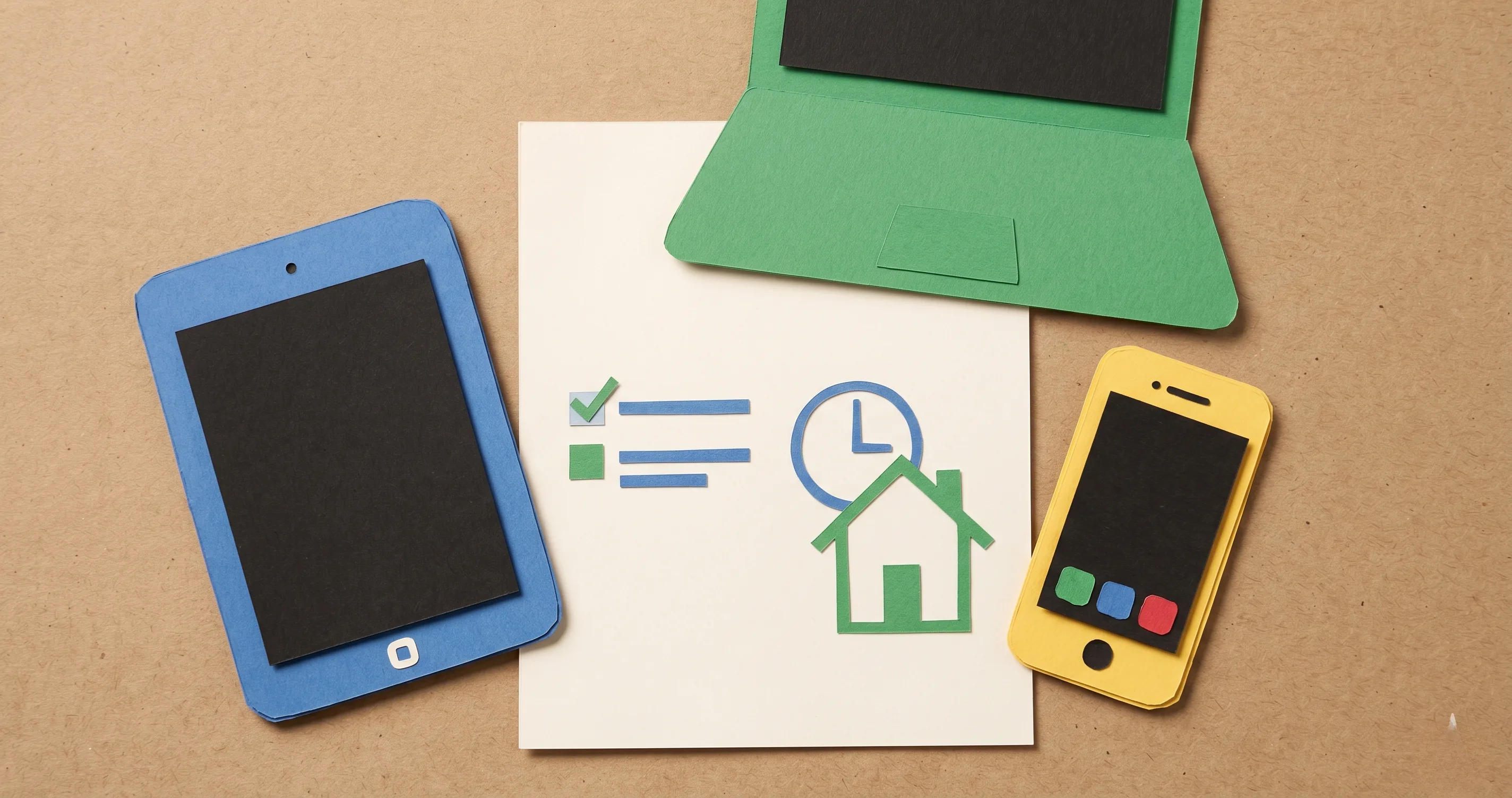 Printed family media plan document on a kitchen table with devices nearby - family media plan